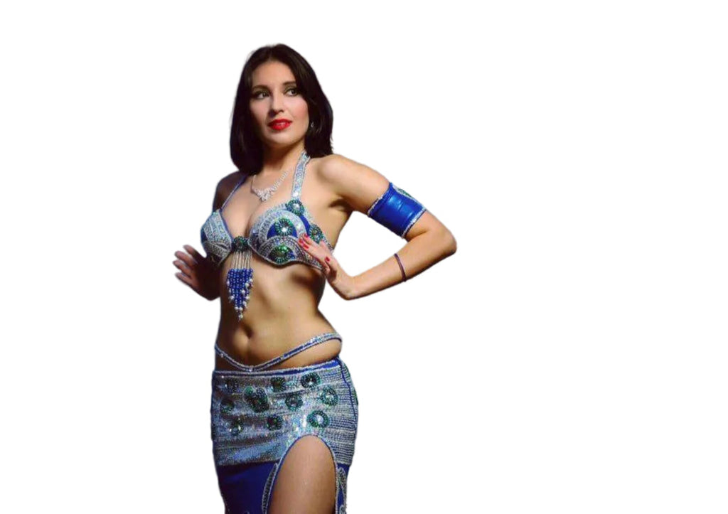 Woman wearing a blue and silver costume on a white background