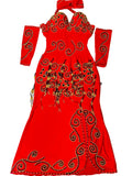 A vibrant red professional belly dance dress with ornate gold embellishments, arm pieces, and a headpiece laid out on a flat surface.