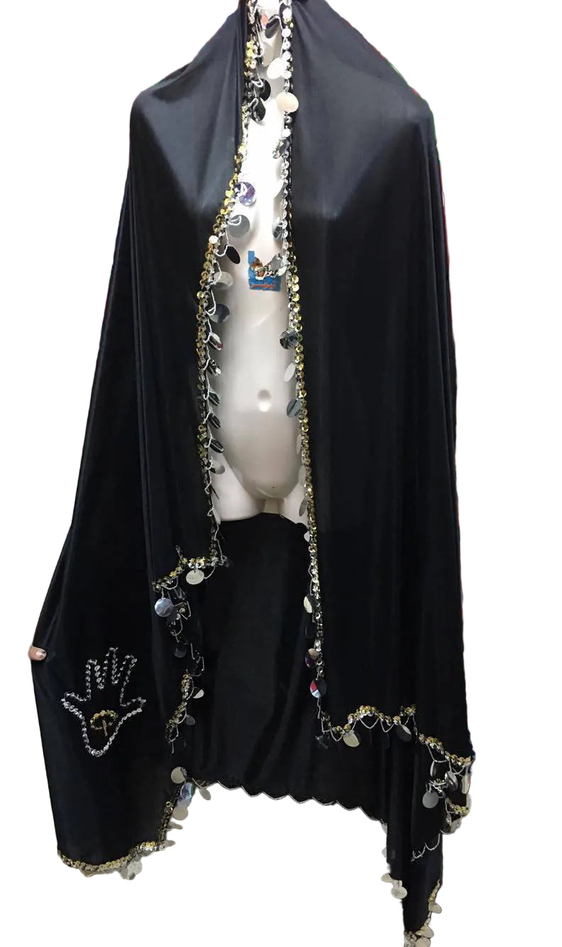 A black Egyptian Iskandaryan Melaya scarf with white hand-made embroidery, displayed against a colorful patterned background.