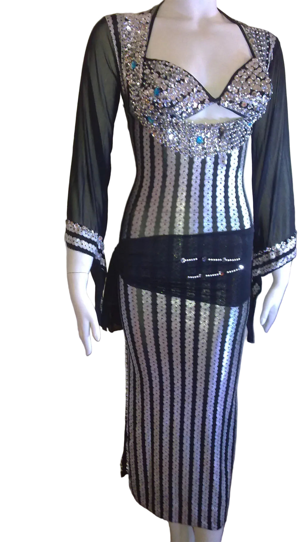 Black and silver dress with sequin embellishments on a mannequin against a white background