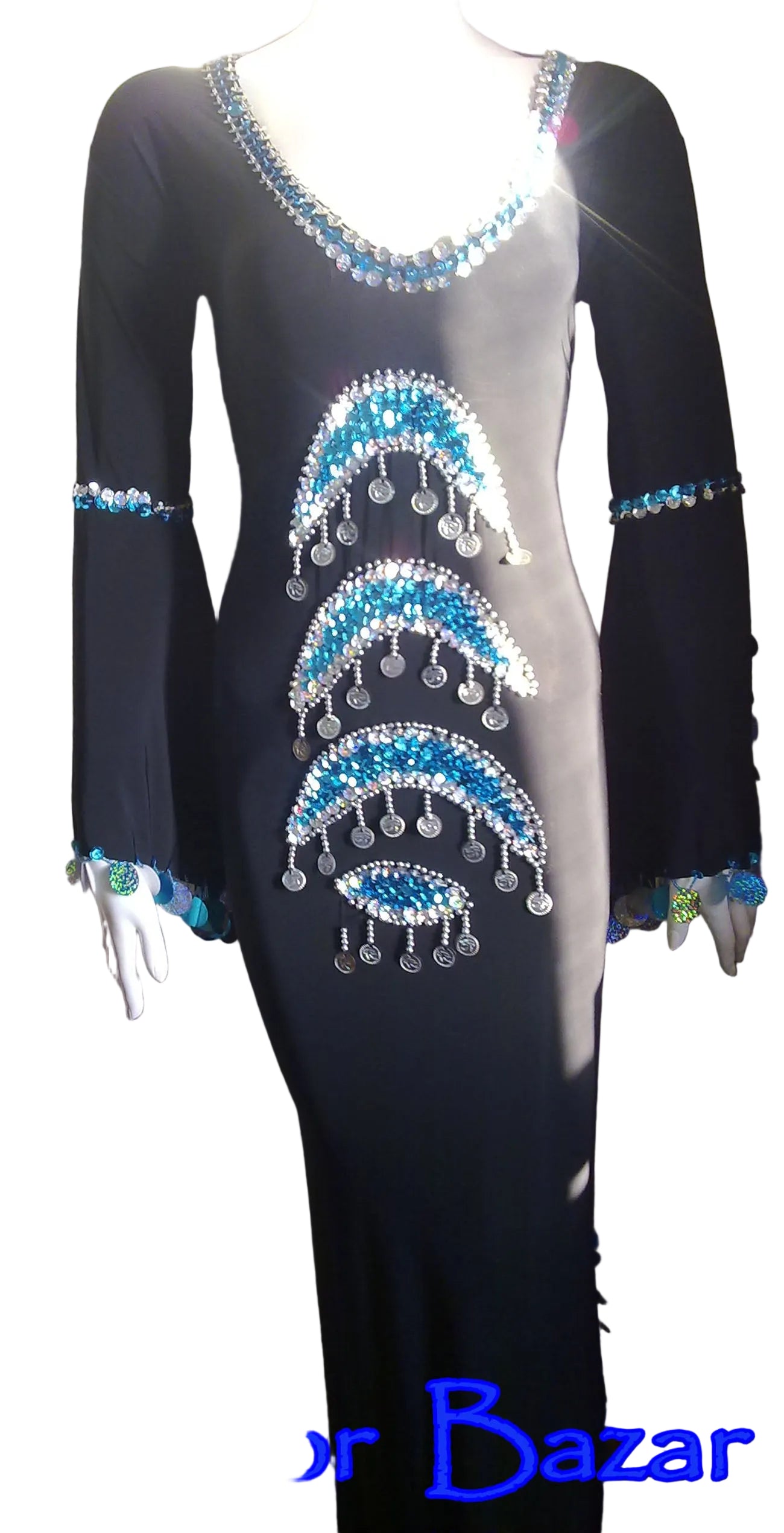 A black belly dance costume with blue and turquoise handmade embroidery, displayed on a mannequin.