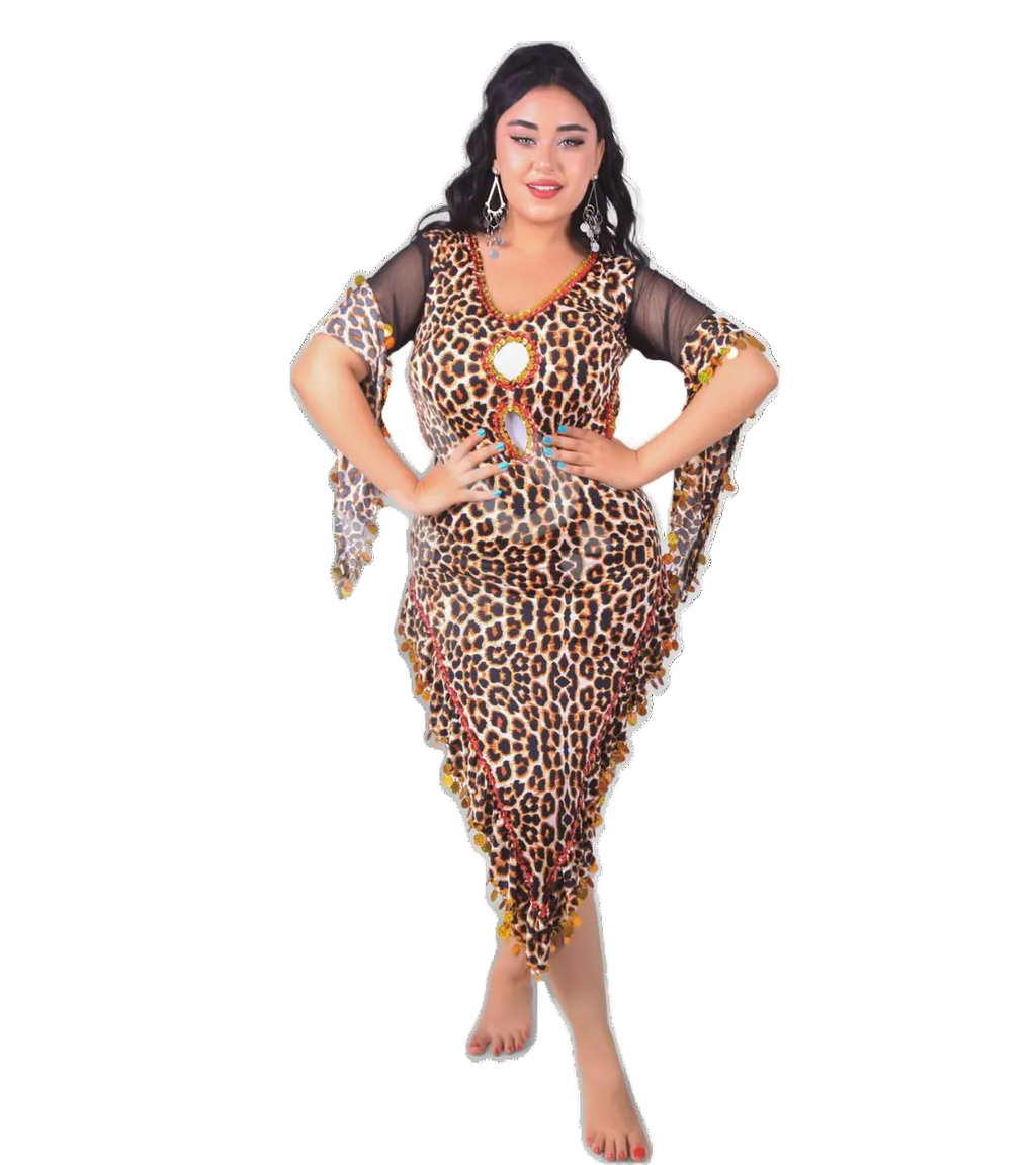 A woman posing in a leopard print belly dance dress with embellishments.