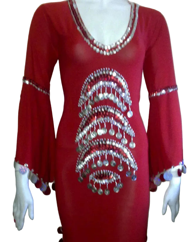 Red dress with silver embellishments on a mannequin against a plain background