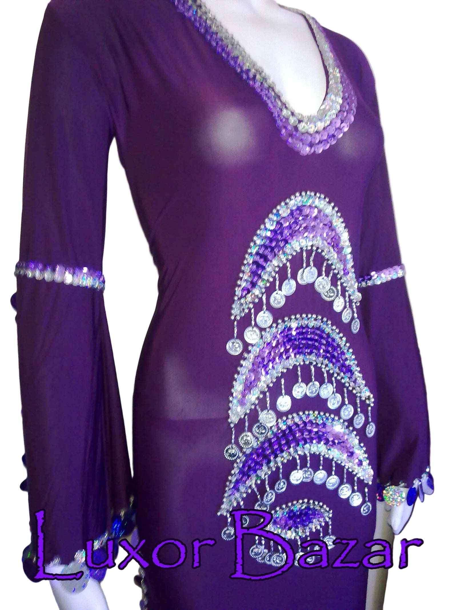Purple dress with bead embellishments on a mannequin, branded 'Luxor Bazar'.