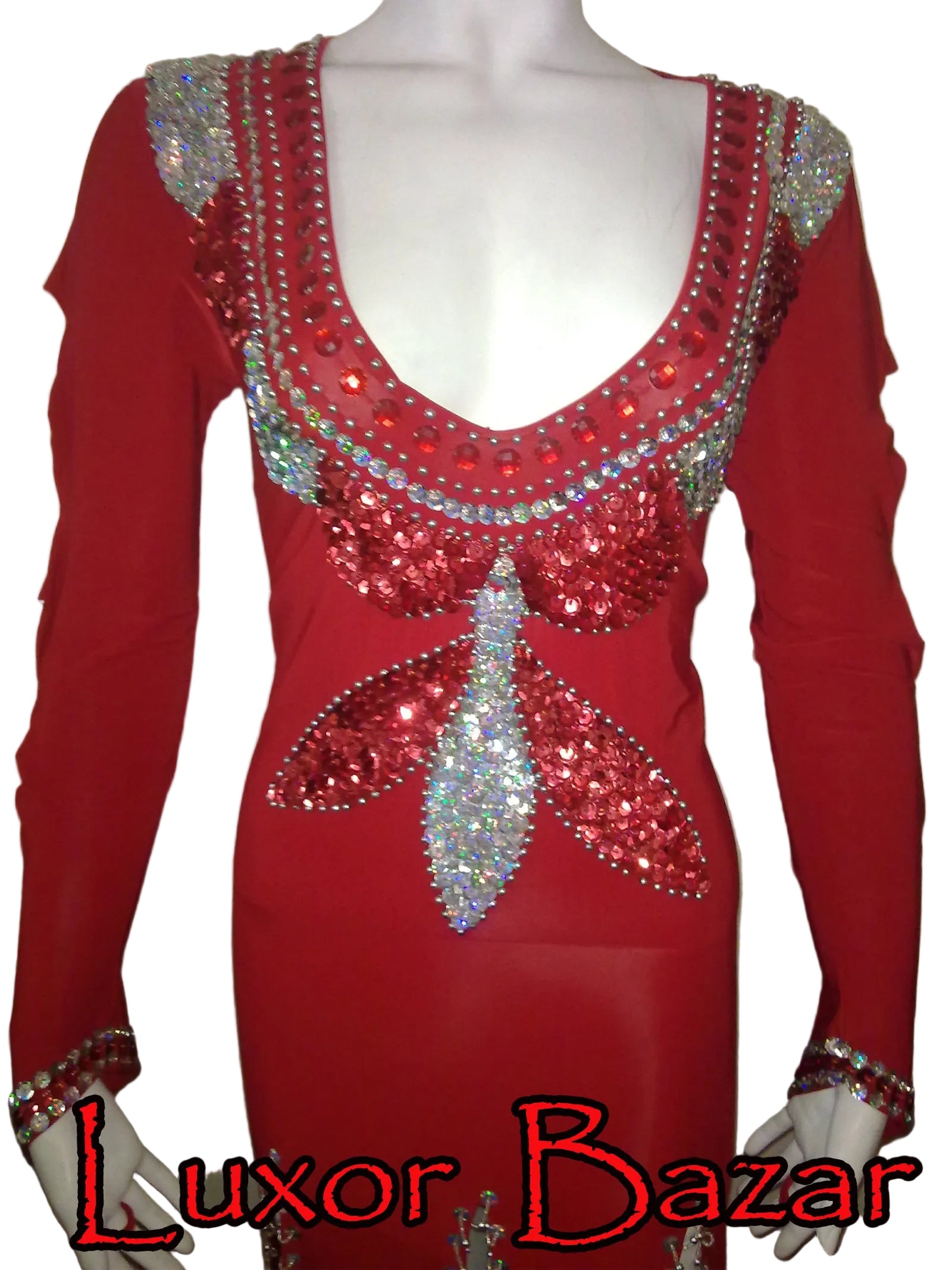 Red dress with intricate beadwork on a mannequin, branded 'Luxor Bazar'.