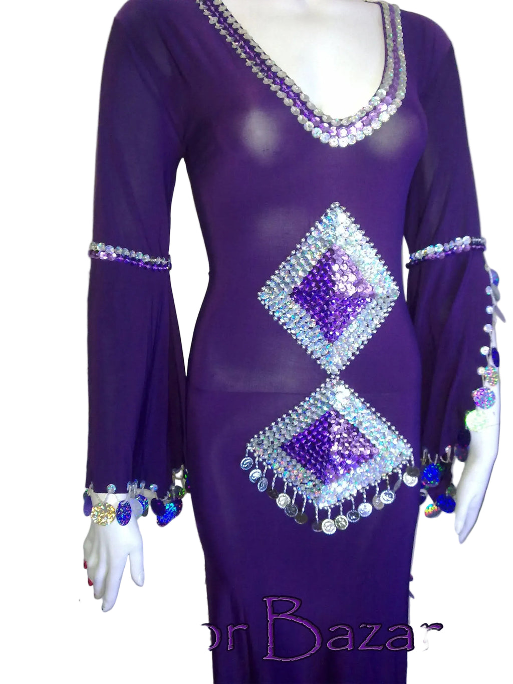 Purple dress with bead embellishments on a plain background, branded 'Luxor Bazar'.