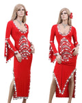 Two mannequins wearing red evening gowns with intricate designs on a white background