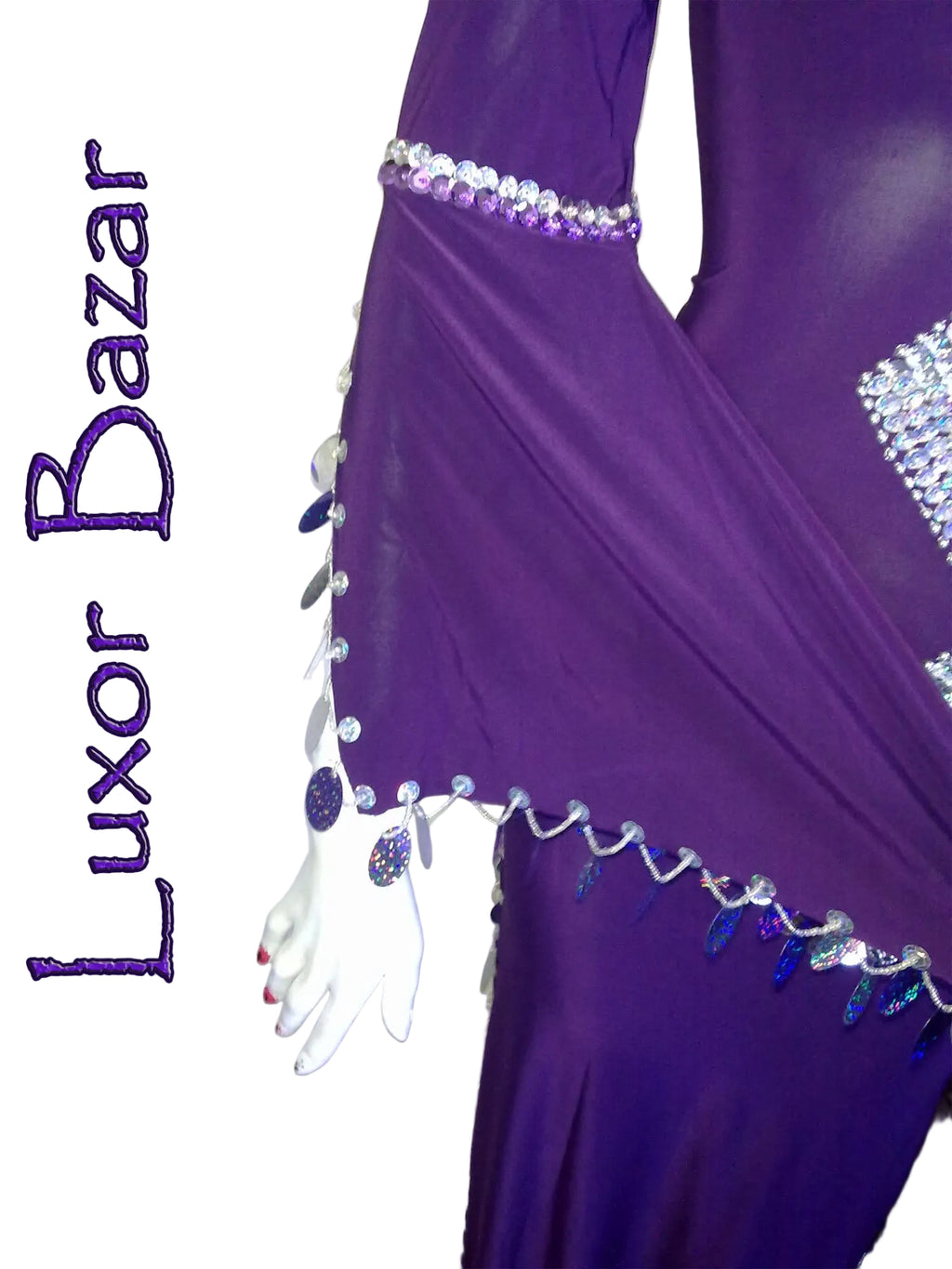 Purple dance costume with decorative elements on a white background, featuring the brand 'Luxor Bazar'.