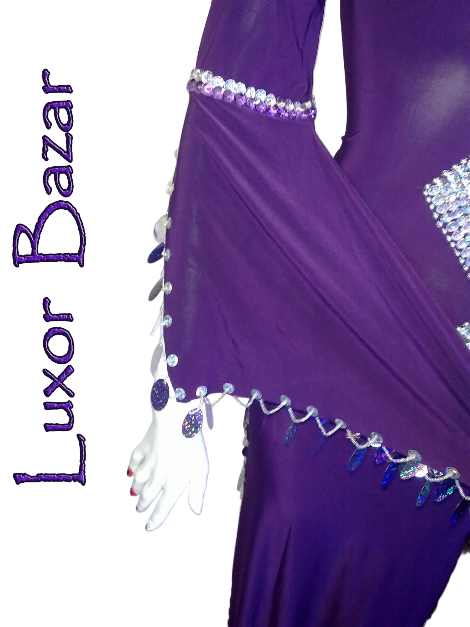Purple dance costume with decorative elements on a white background, featuring the brand 'Luxor Bazar'.