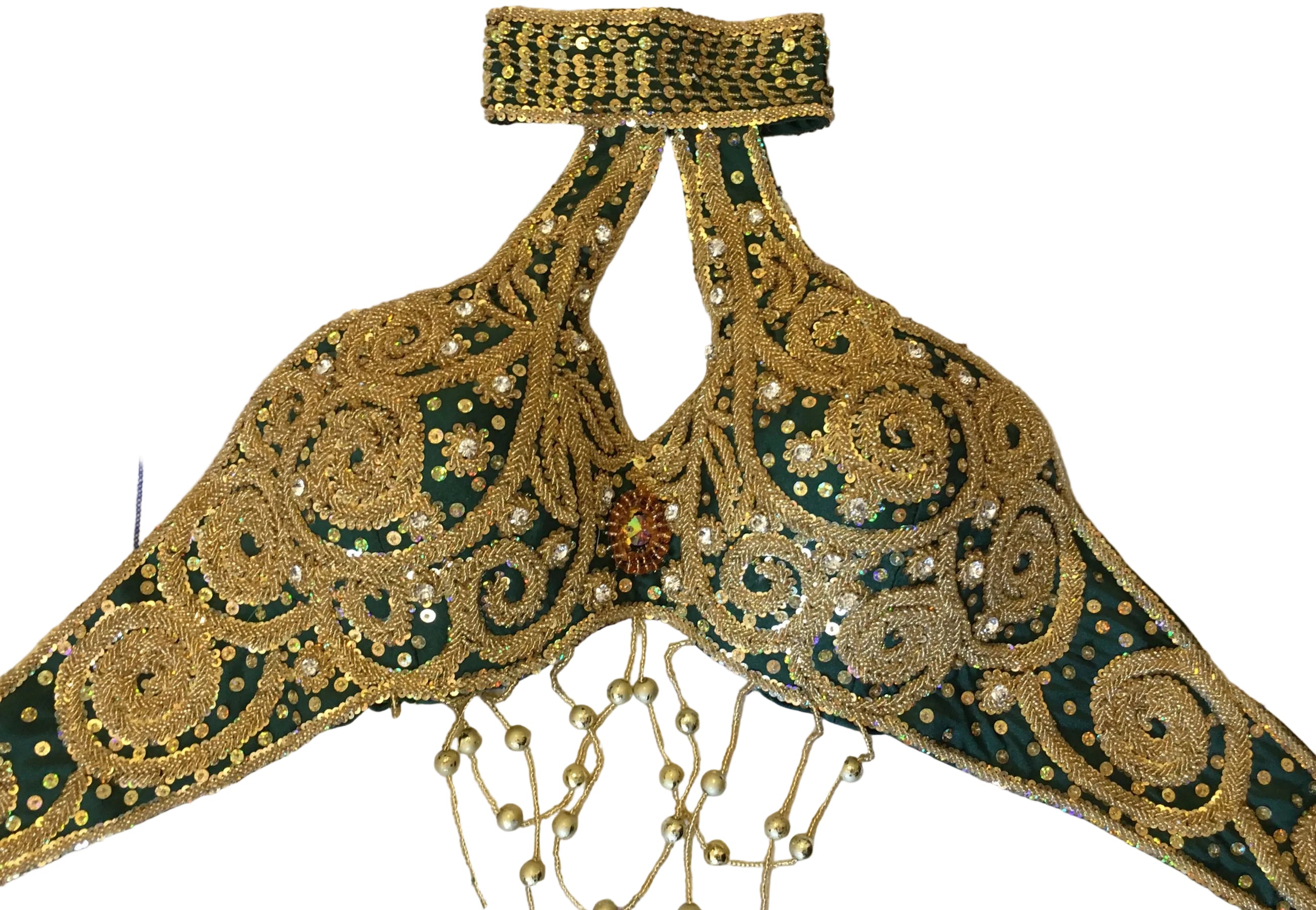 Decorative piece with gold and green embroidery on a floral-patterned fabric background