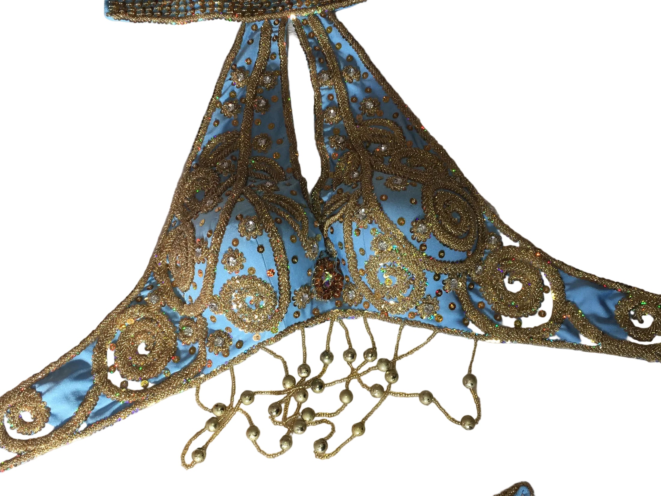 Decorative blue and gold lace trim on a textured fabric background