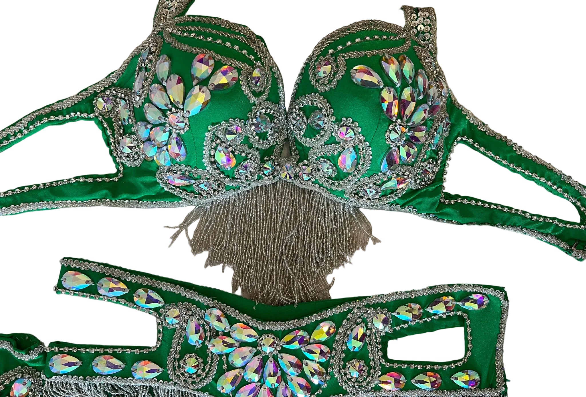 Green embellished bra and belt set on a neutral background