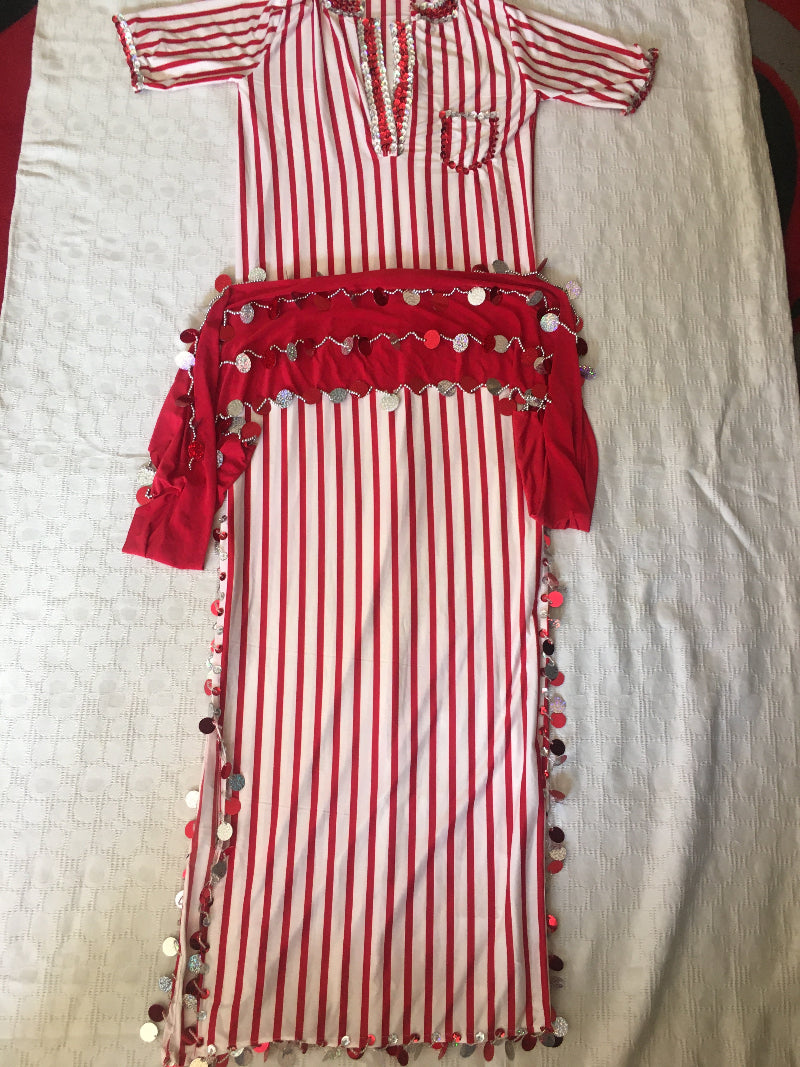 An Egyptian belly dance dress with red and white stripes, including a small matching hip scarf.