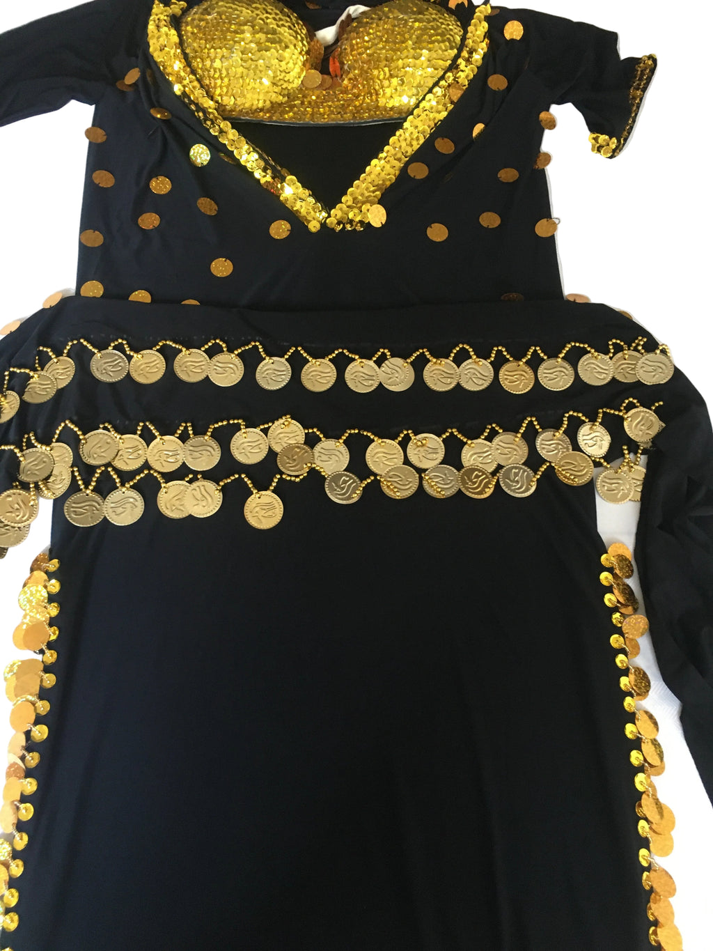 A black belly dance costume with gold embellishments and a heart-shaped headpiece, including a bra and hip scarf.