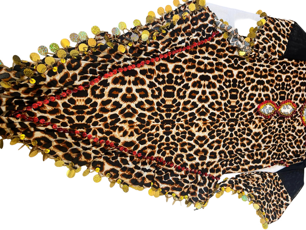 Leopard print fabric with embellishments on a white background