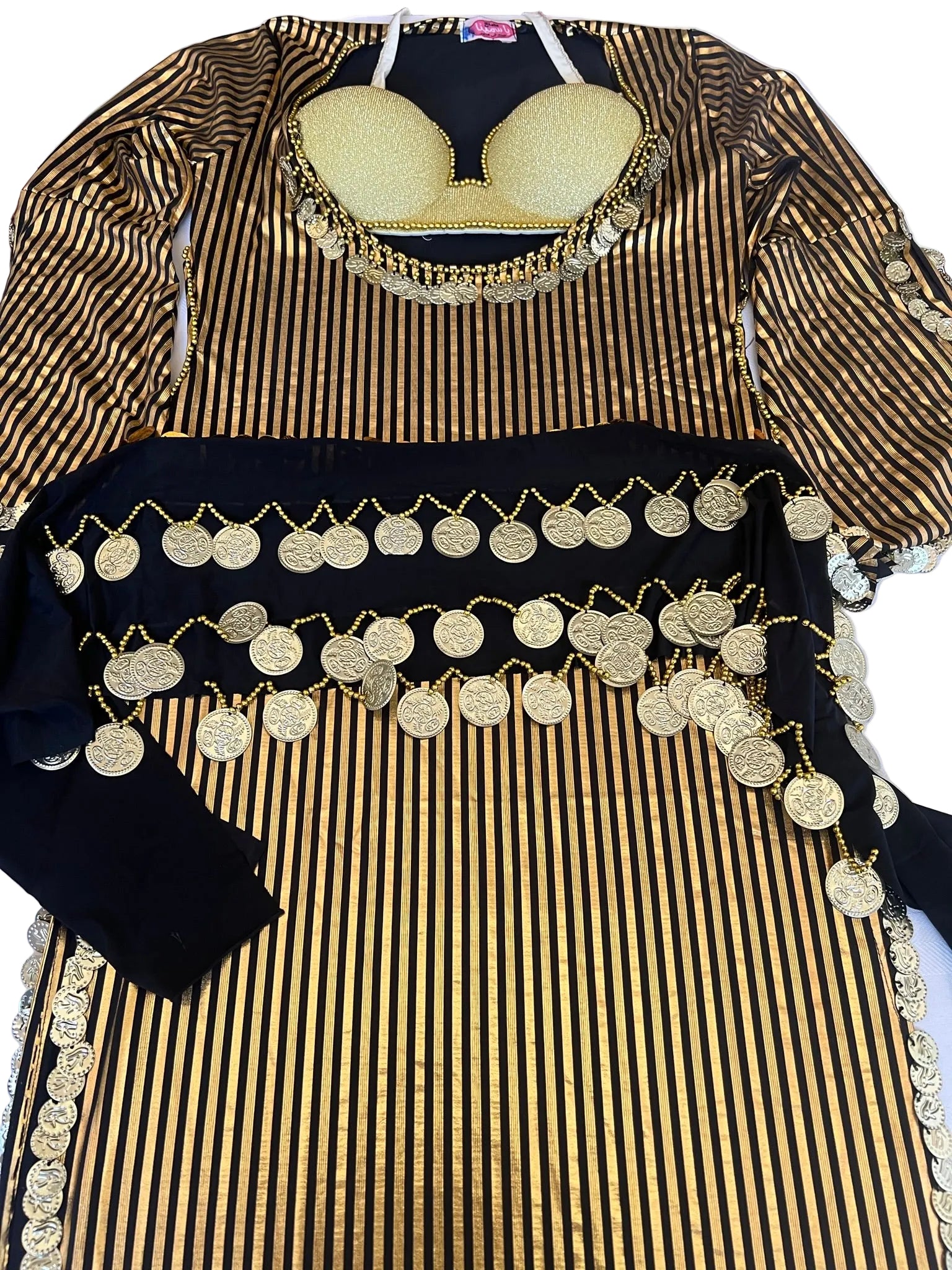 Traditional outfit with gold and black patterns on a white background