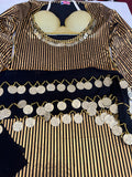 A belly dance outfit with a black and gold striped dress, a matching bra, and a scarf, adorned with handmade embroidery and metal accents.
