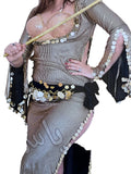 A model wearing an Egyptian Oriental Belly Dance Dress with embellishments and a bracelet, holding a staff accessory.