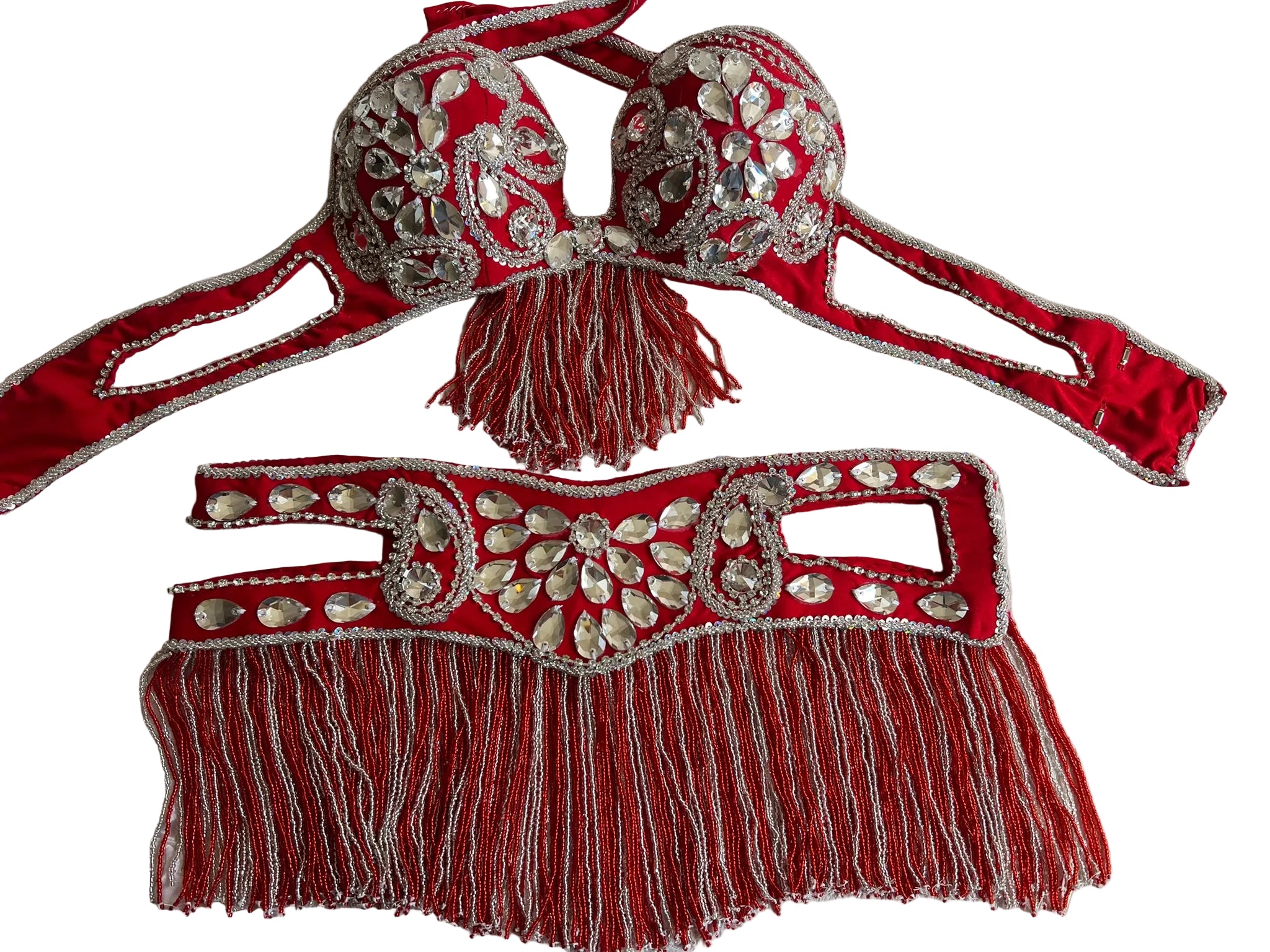 A professional Egyptian belly dance costume set featuring a red belt with embellishments and a matching red bra, both adorned with glass stones, beads, and sequins.