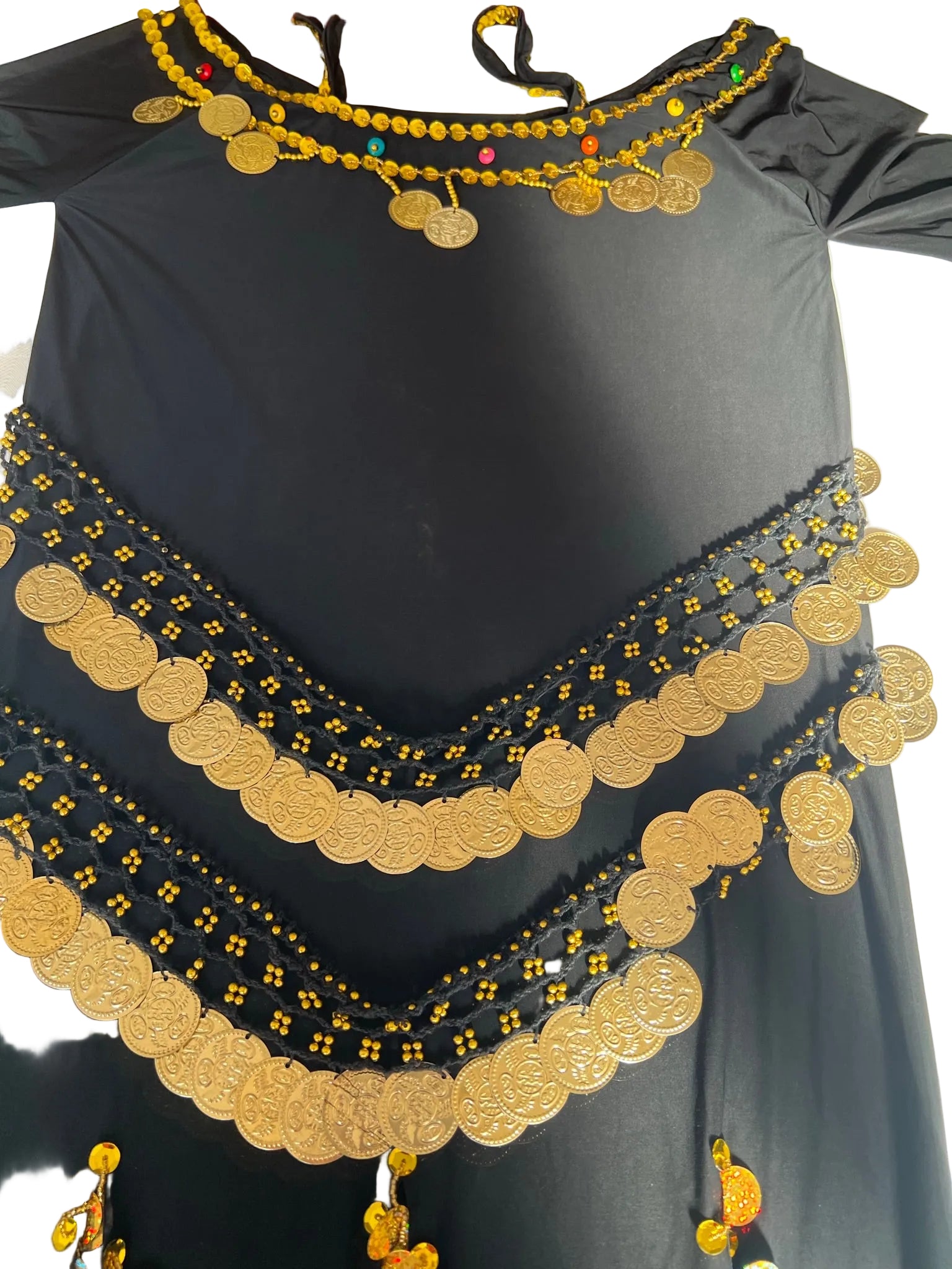 Black garment with gold coin embellishments on a white background