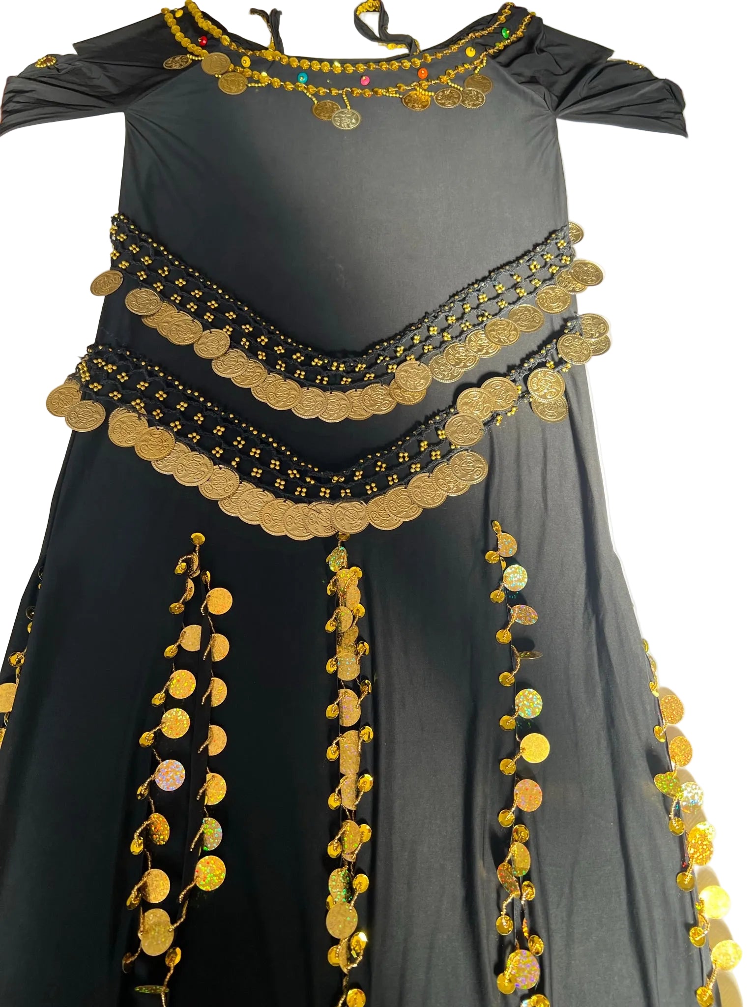 Black dress with gold embellishments on a white background