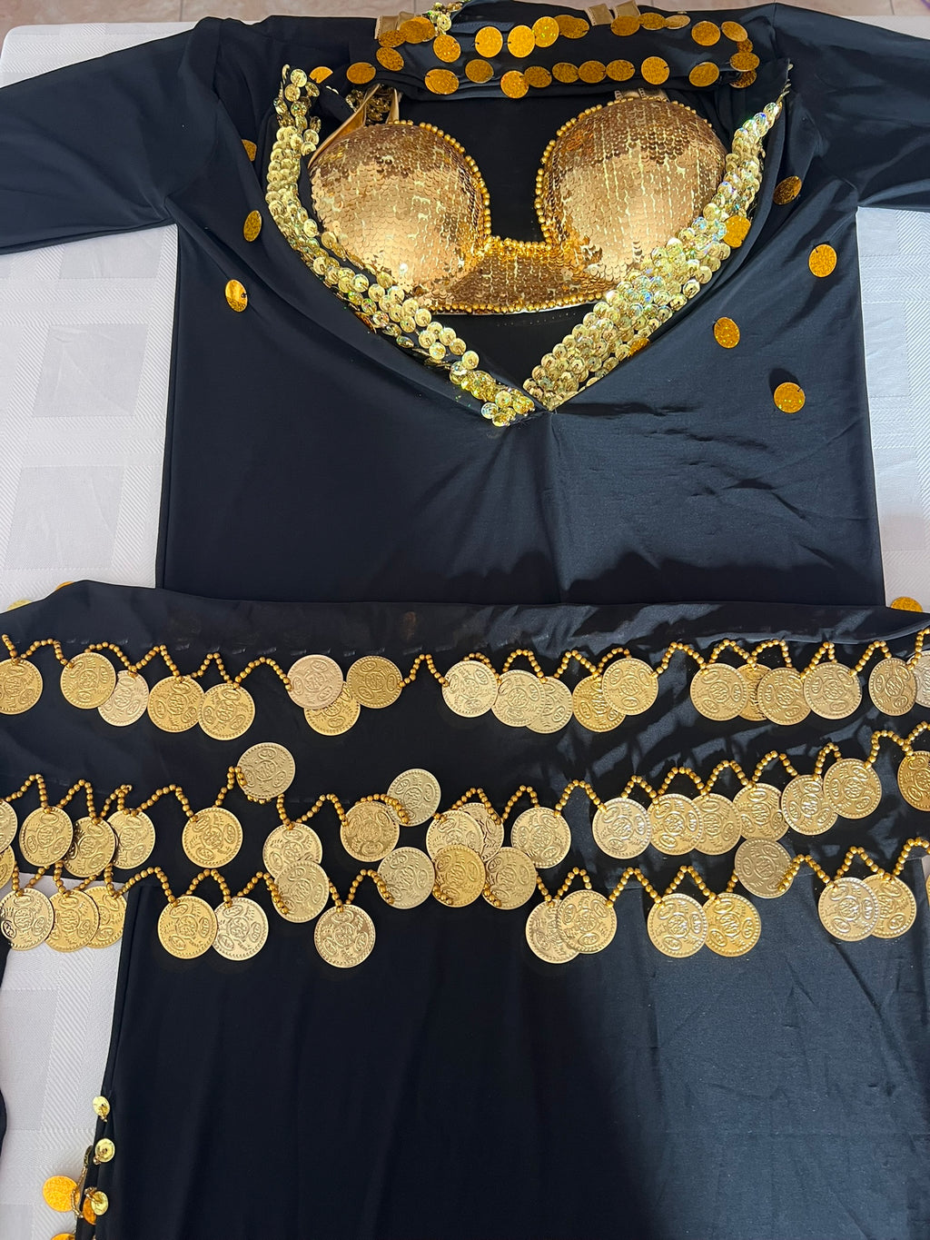Black garment with gold embellishments on a white background