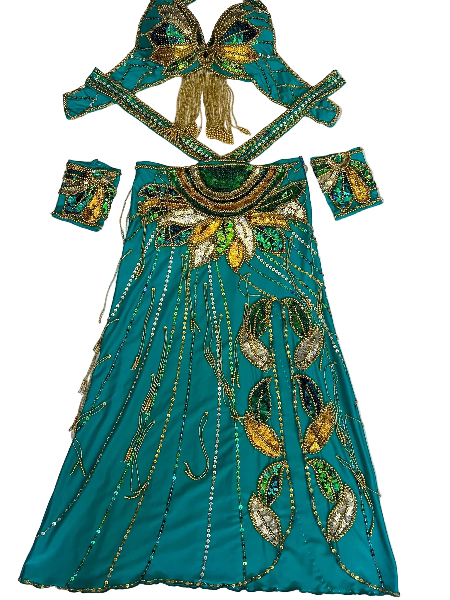 Teal embroidered outfit with gold and green details on a white background