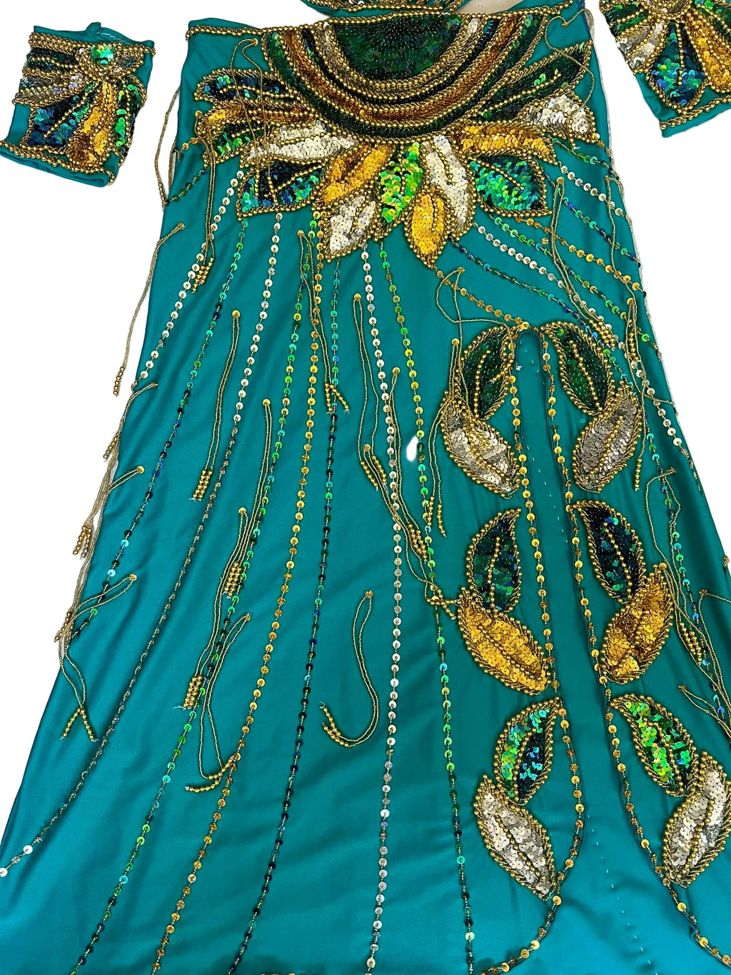 Teal fabric with intricate gold and green beadwork on a white background
