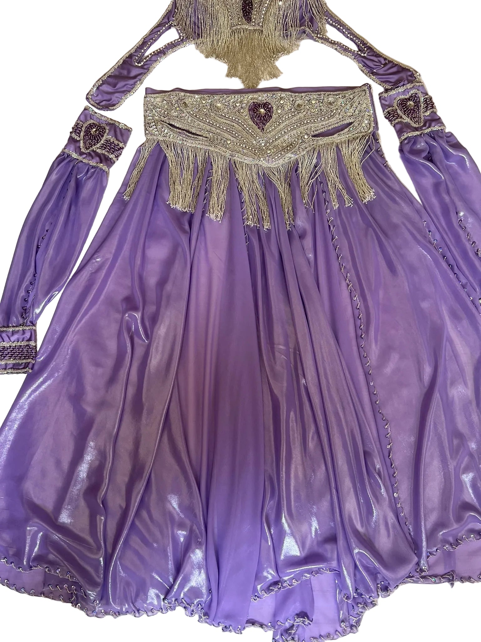 Purple dress with intricate beading and embroidery on a white background