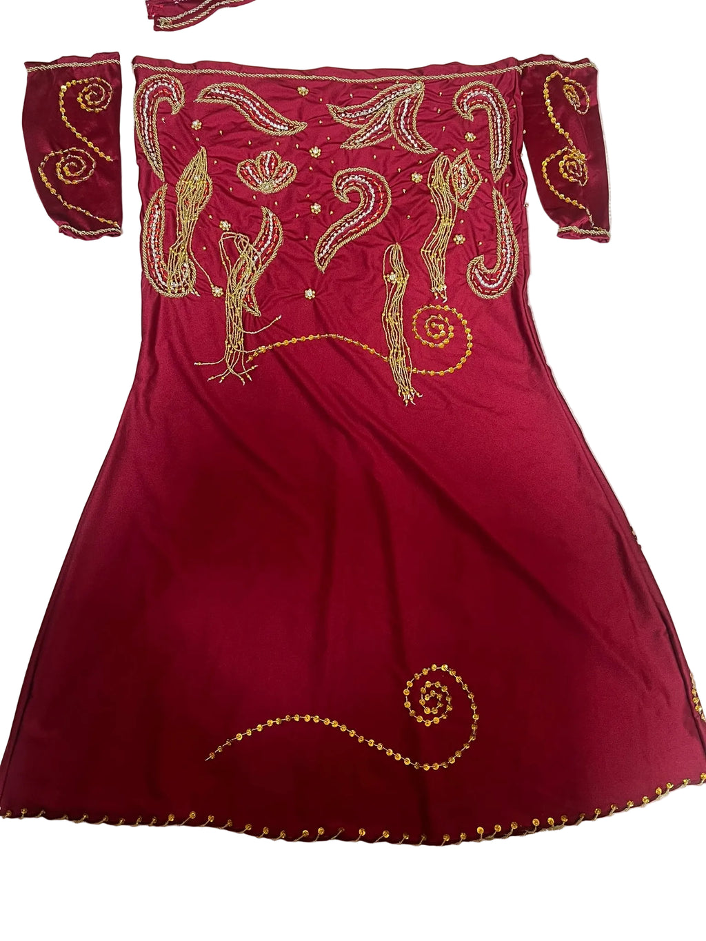 Red Belly dance dress with gold embroidery on a white surface