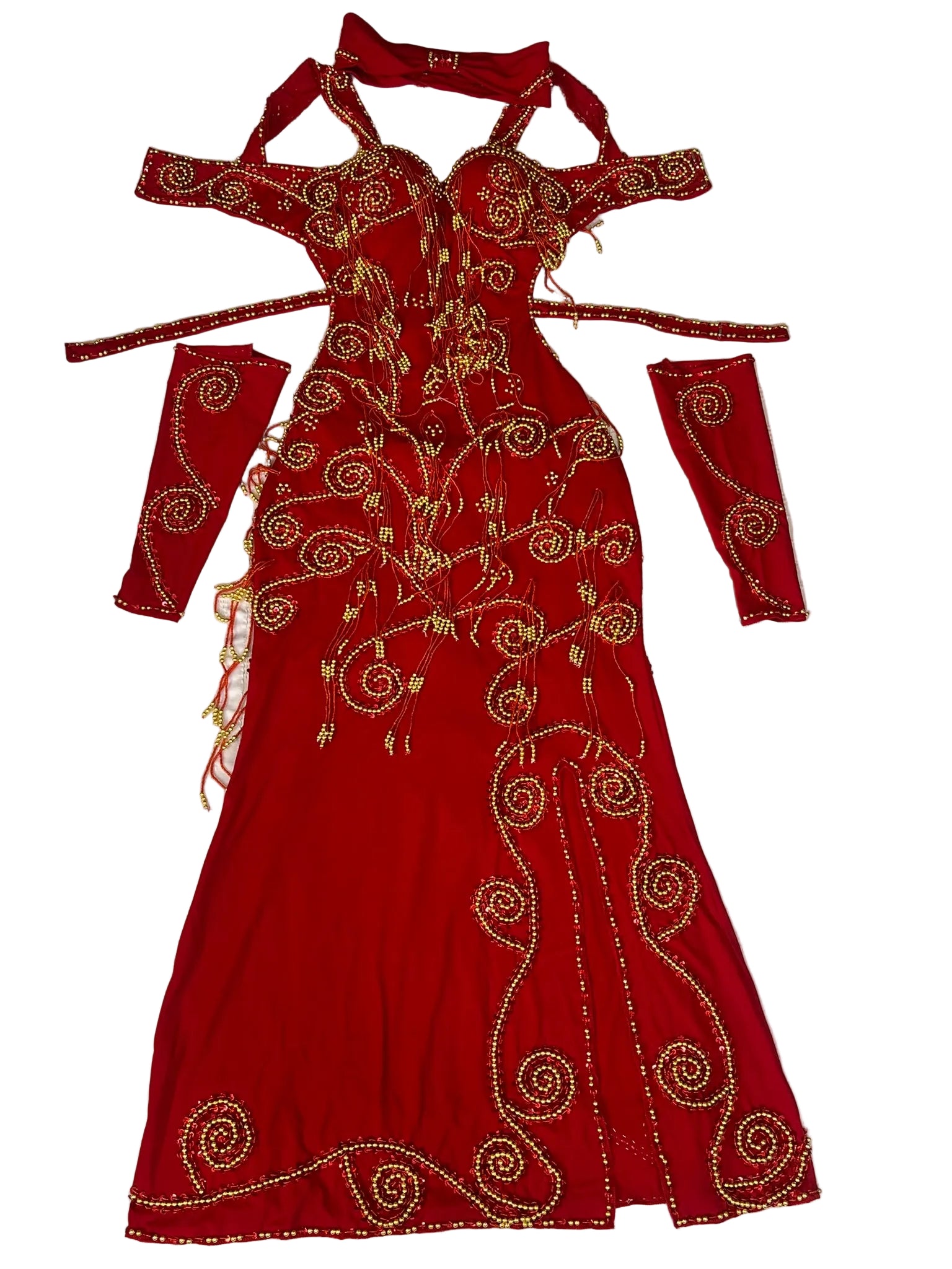 Red embroidered dress with gold patterns on a white background