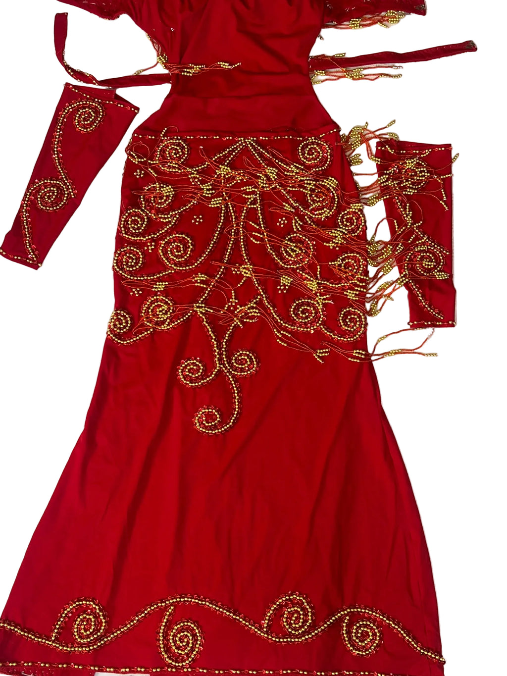 Red traditional outfit with gold embroidery on a light background