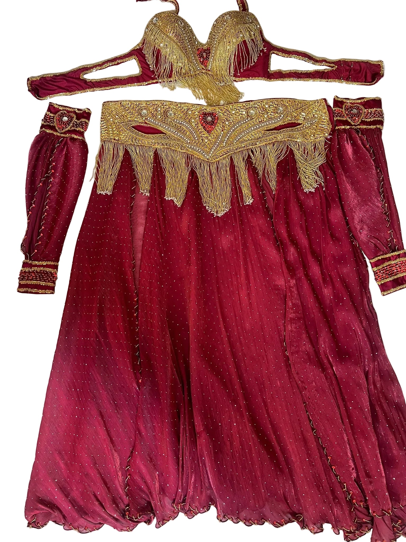Red belly dance costume with gold embroidery on a white background
