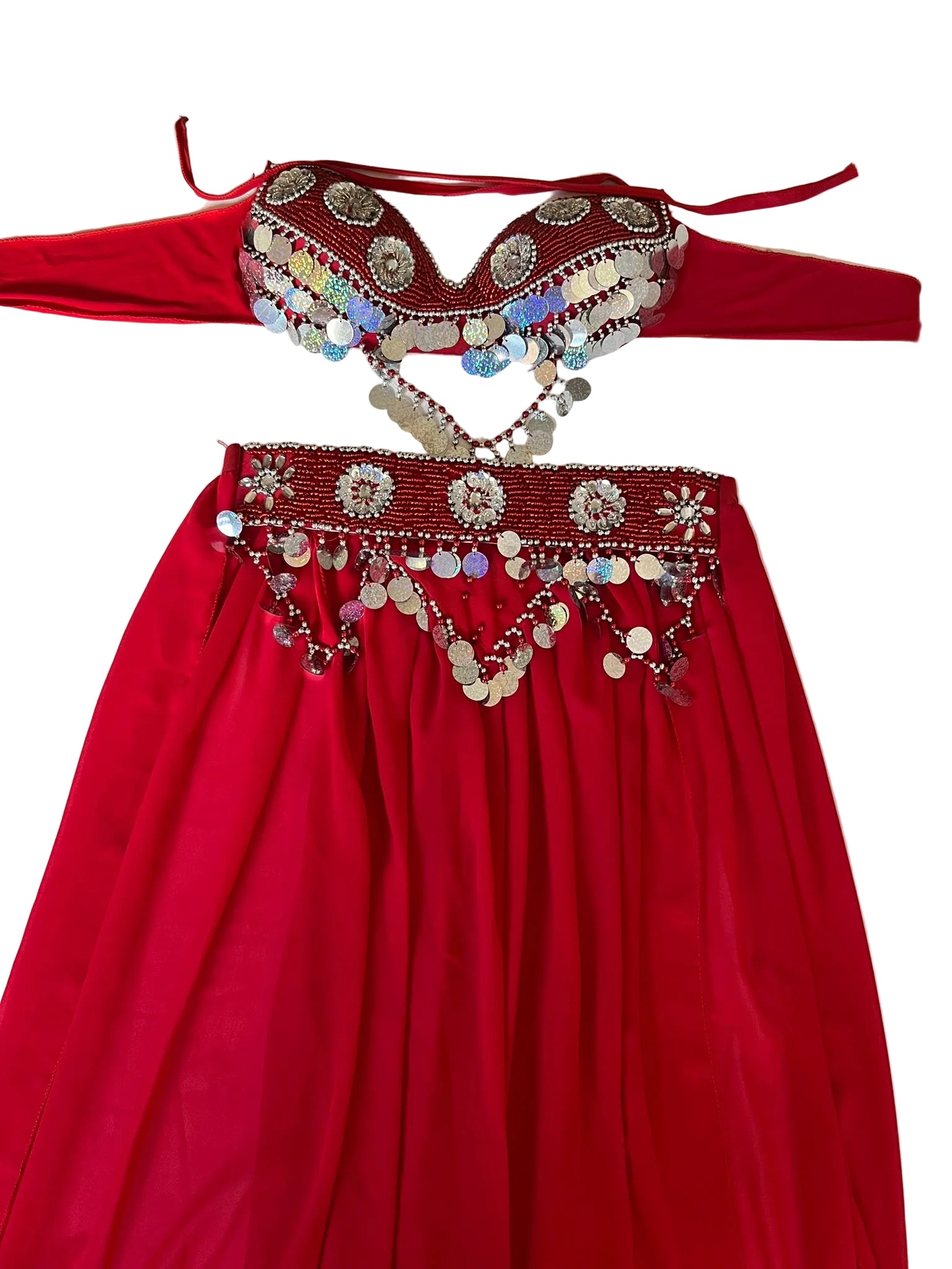 Red dress with intricate beading and embroidery on a white background