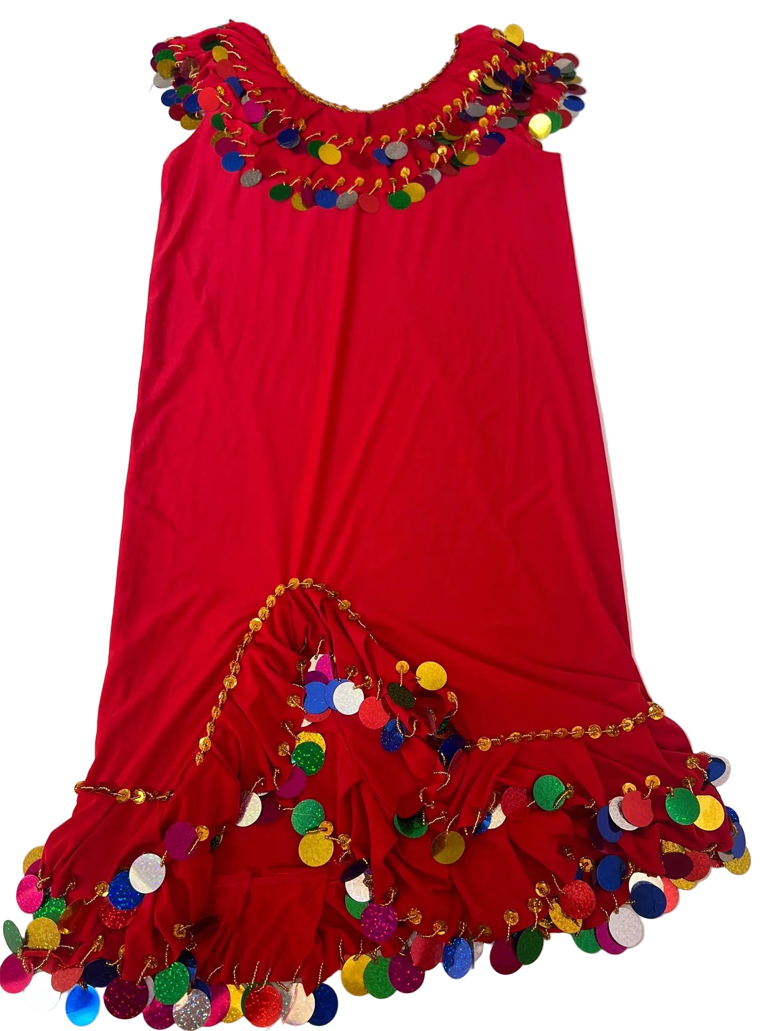 A red belly dance dress with handmade embroidery and multicolored accents laid out on a white surface.