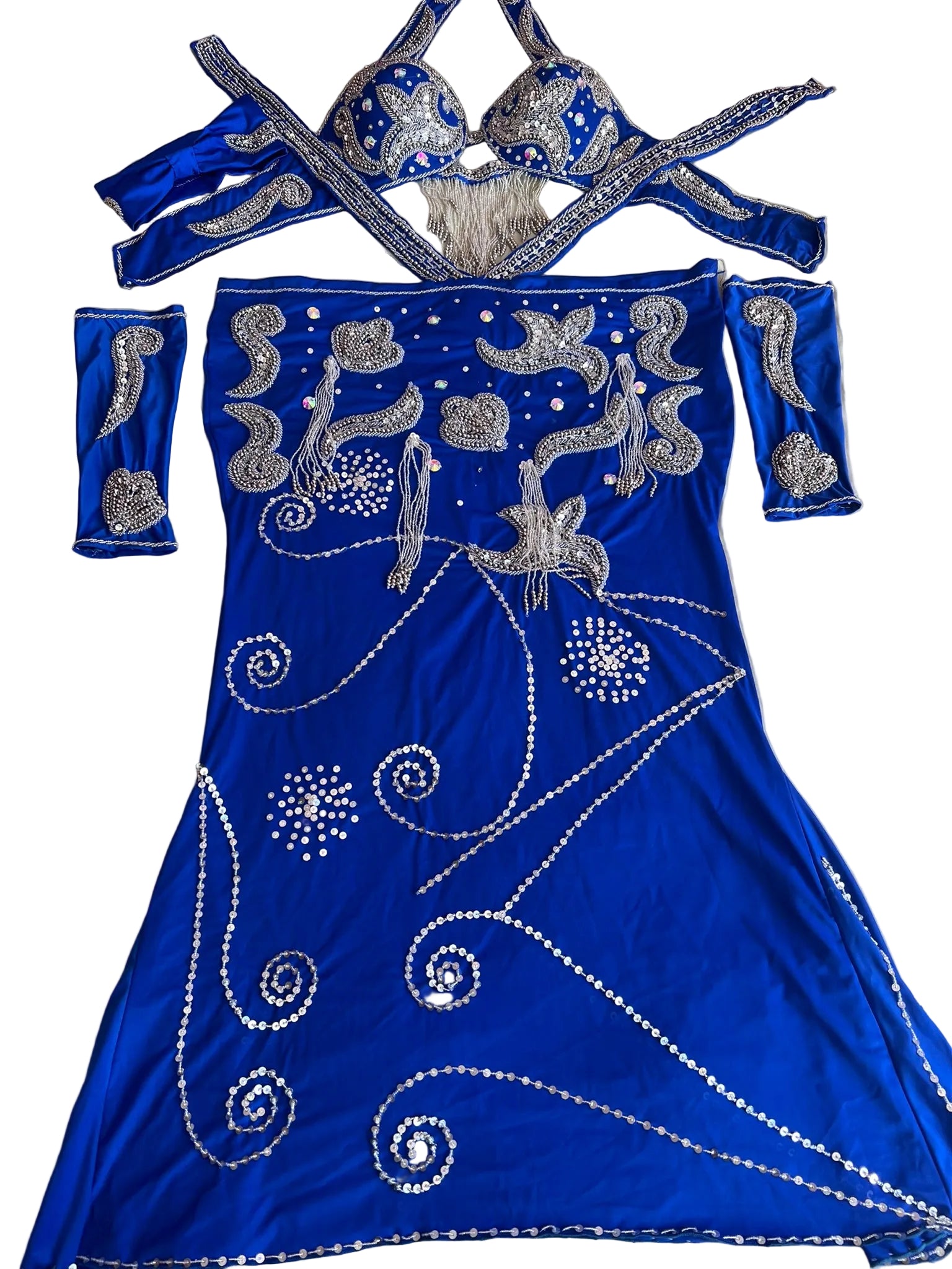 A custom-made blue belly dance costume with embroidered details, including a skirt, bra, and sleeves, adorned with glass beads and sequins.