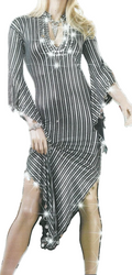 A mannequin showcasing a black and white striped belly dance dress with embellishments and a flowing skirt.
