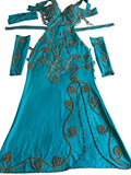A custom-made blue belly dance costume with intricate white embroidery, including a dress, two sleeves, and a headband.