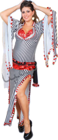 Woman wearing a black and white striped outfit with red accents on a plain background