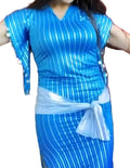A person wearing a traditional Egyptian Saidi costume, featuring a black and blue striped pattern, commonly known as a Galabia, used for belly dance performances.