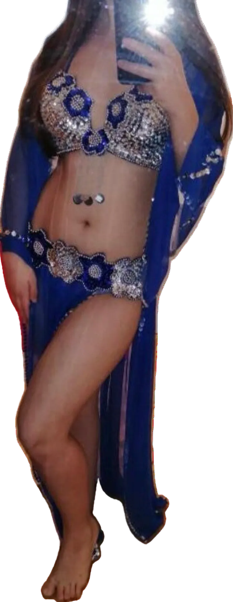 Belly dancer costume with blue and silver outfit on a white background