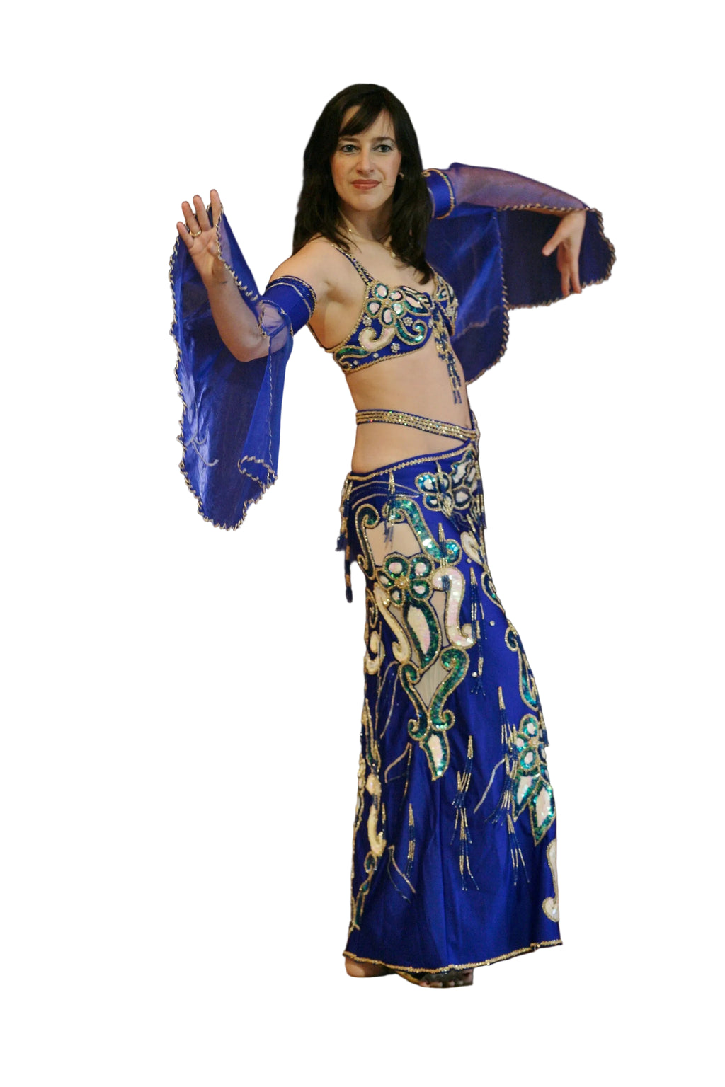 Woman wearing a blue and gold belly dance costume on a white background