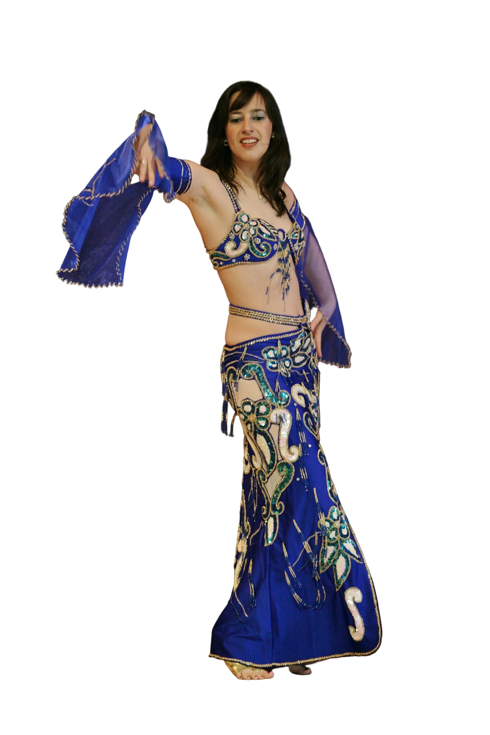 Woman wearing a blue and gold belly dancing costume on a white background