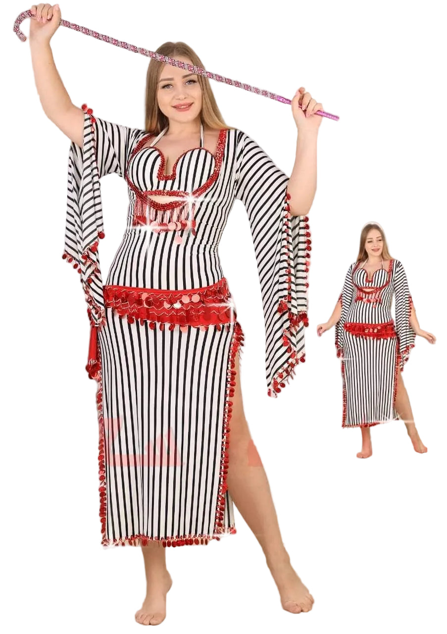 Woman wearing a black and white striped belly dance outfit with red accents, holding a dancing stick.