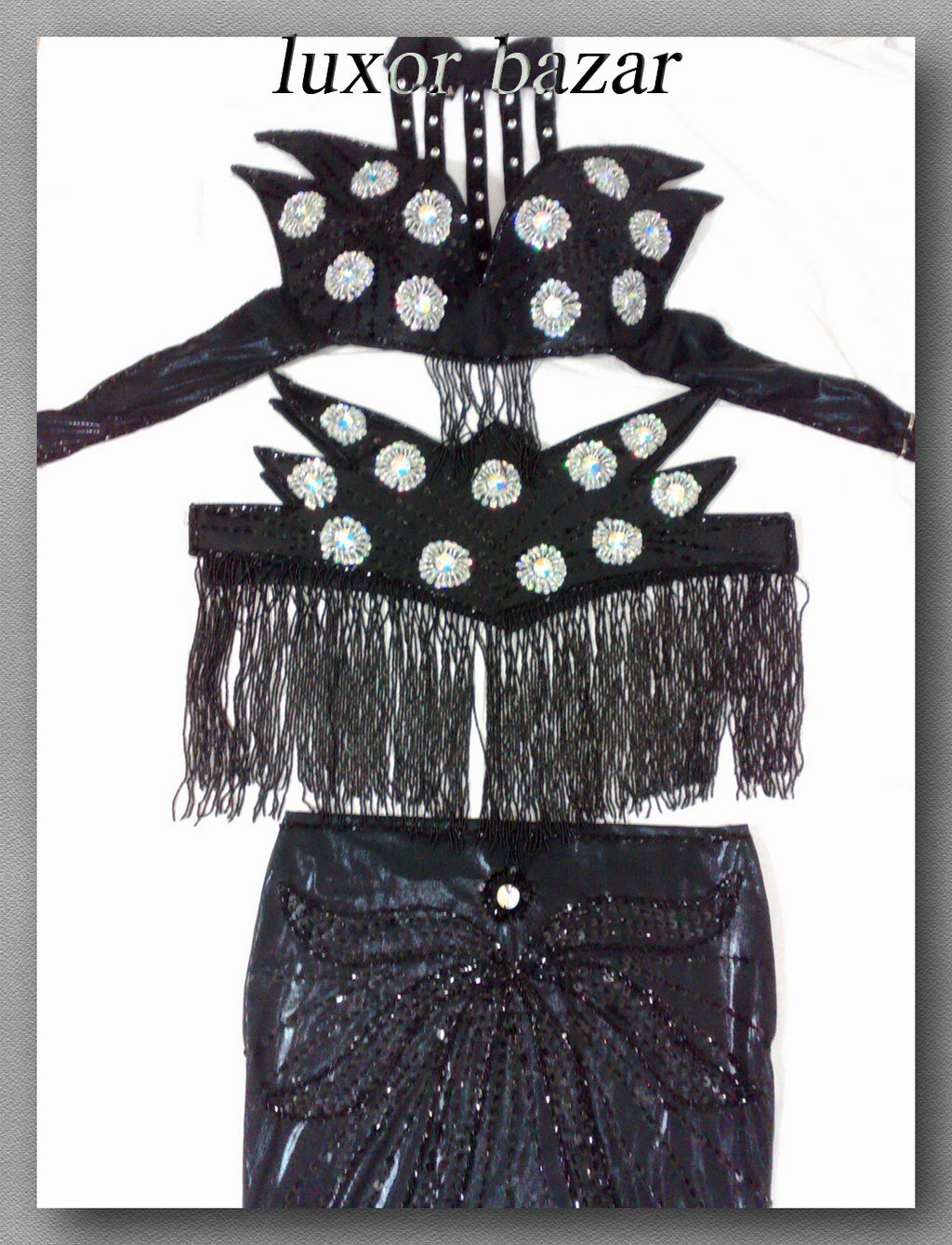 professional belly dance costume set, which includes a skirt, belt, and top with bead and sequin decorations.