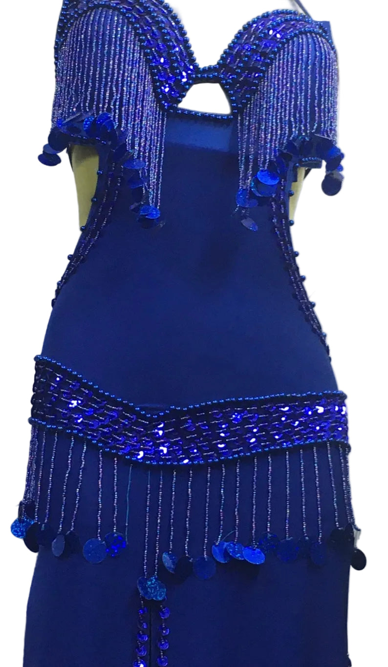 A blue belly dance costume with handmade embroidered details and large sequins, displayed on a mannequin.