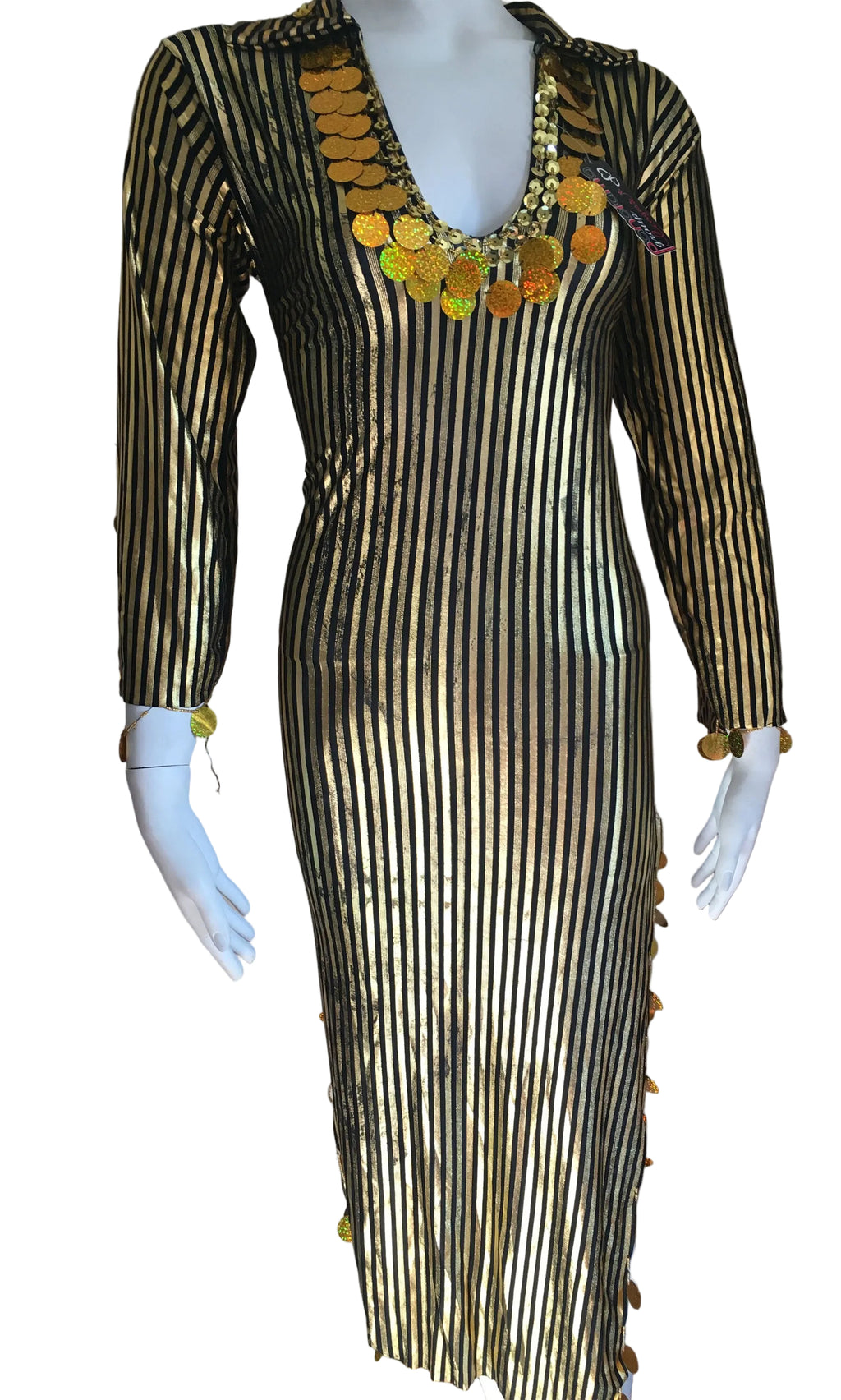 Mannequin wearing a black and gold dress with decorative elements, branded 'Luxor Bazar'.
