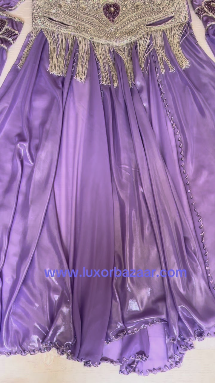 Video showing purple belly dance costume adorned with silver beads and rhinestones 