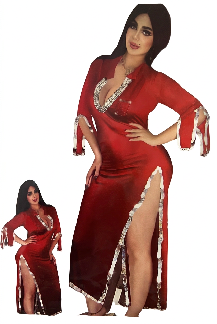 Red Saidi belly dance galabia modeled with one hand on the hip, showing silver-tone sequin trim and a high side slit.
