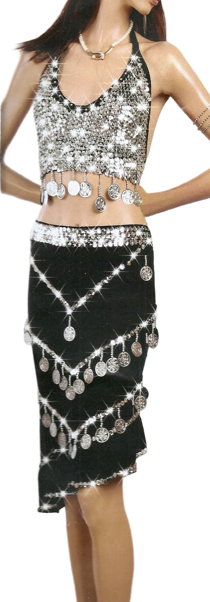 Black and silver sequin outfit with skirt on a white background